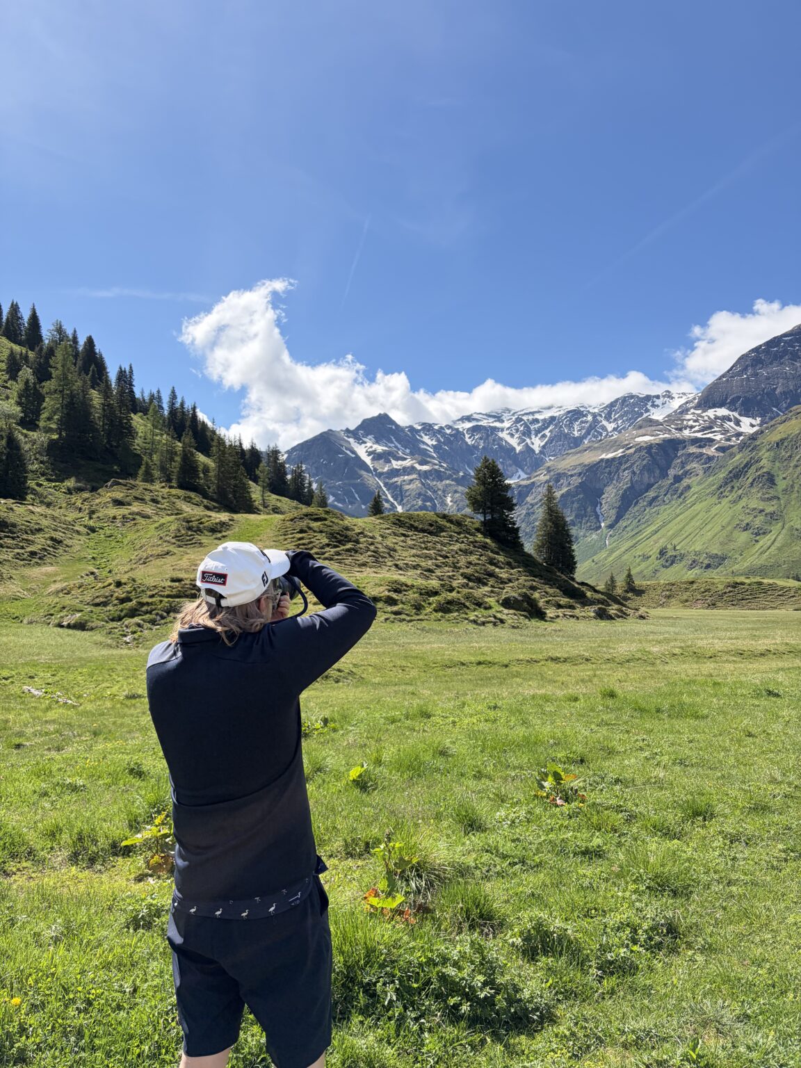 Landscape photographer capturing the alpine scenery of Sportgastein in Hohe Tauern National Park, Austrian Alps.